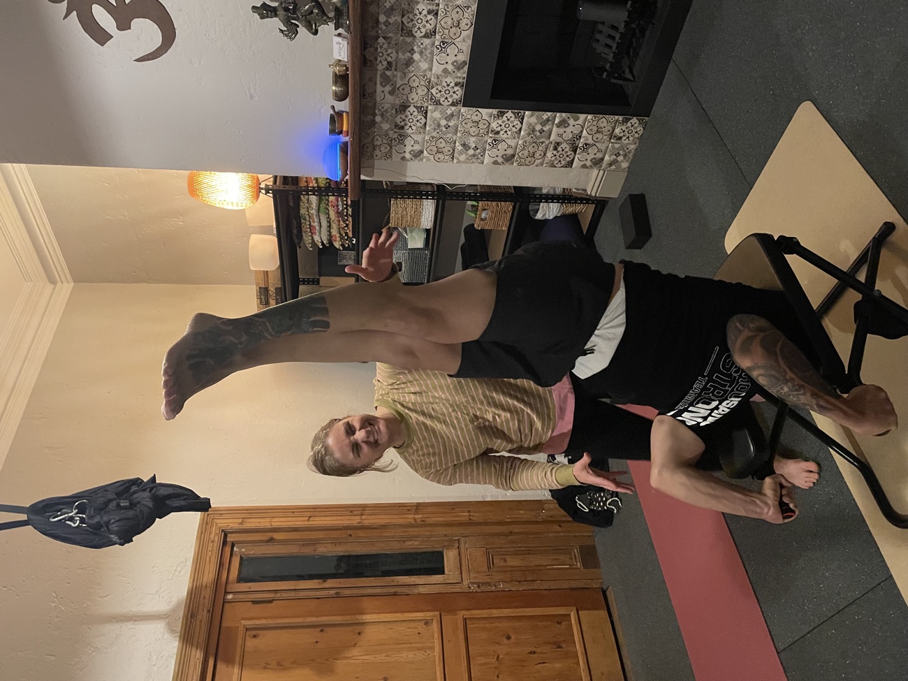 Heidi giving hands-on support to a student during an inversion